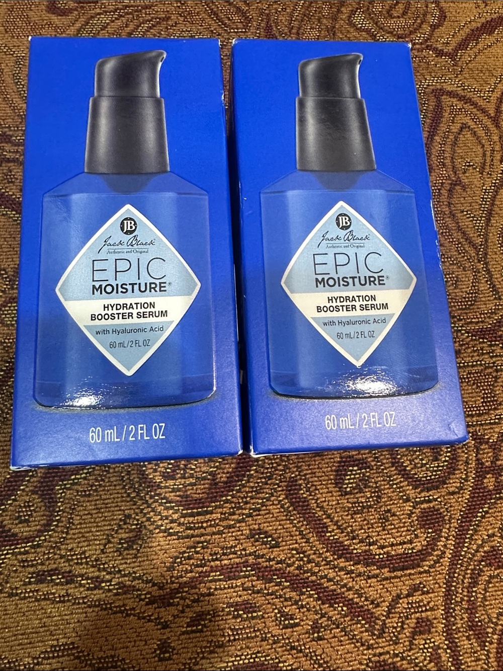 Two bottles of Jack Black Epic Moisturizer Booster Serum